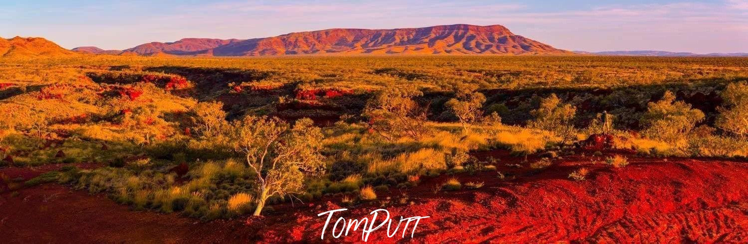 A landscape of long mountain walls, Hammersley Range - Karijini, The Pilbara