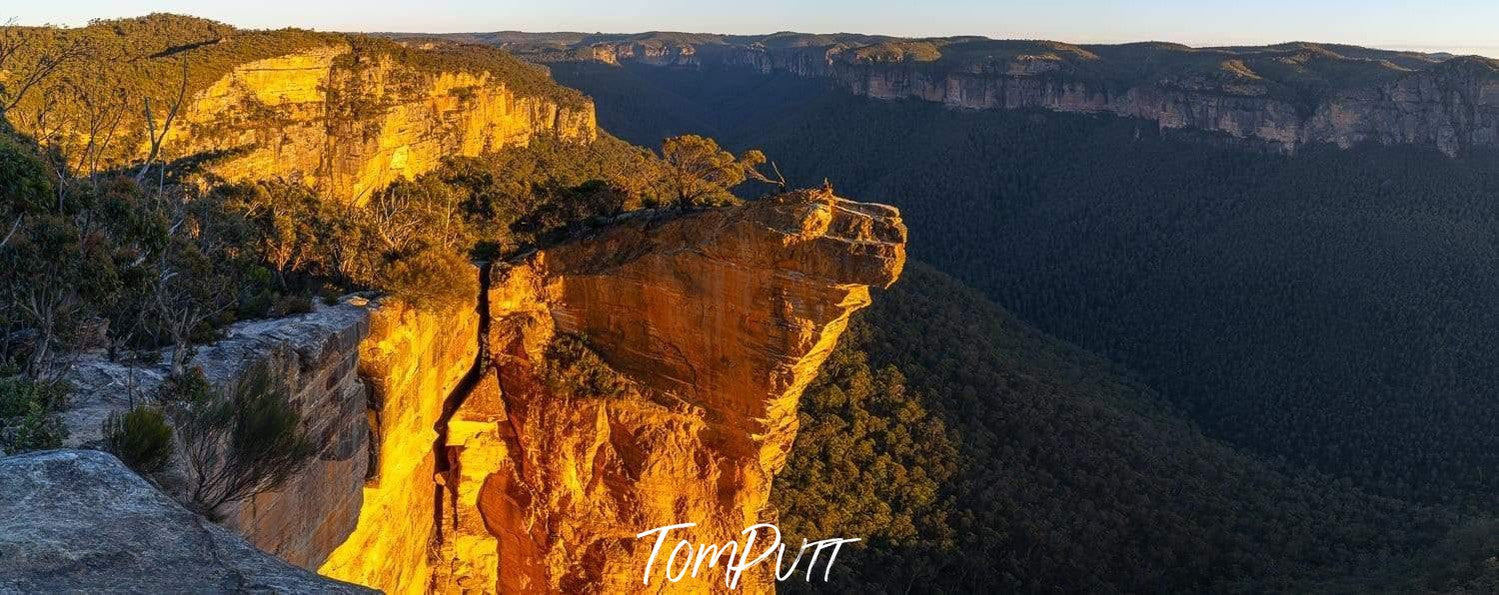 A large mountain top with a shiny golden effect, Hanging Rock - Blue Mountains NSW