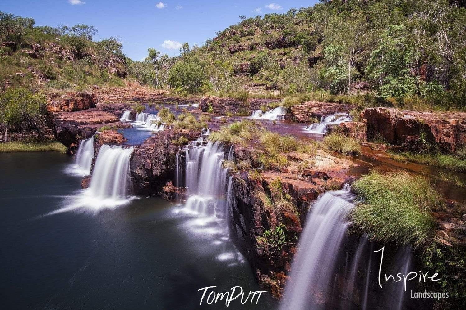 Waterfalls from a mountain wall in a lake, Hollywood Falls, The Kimberley, Western Australia