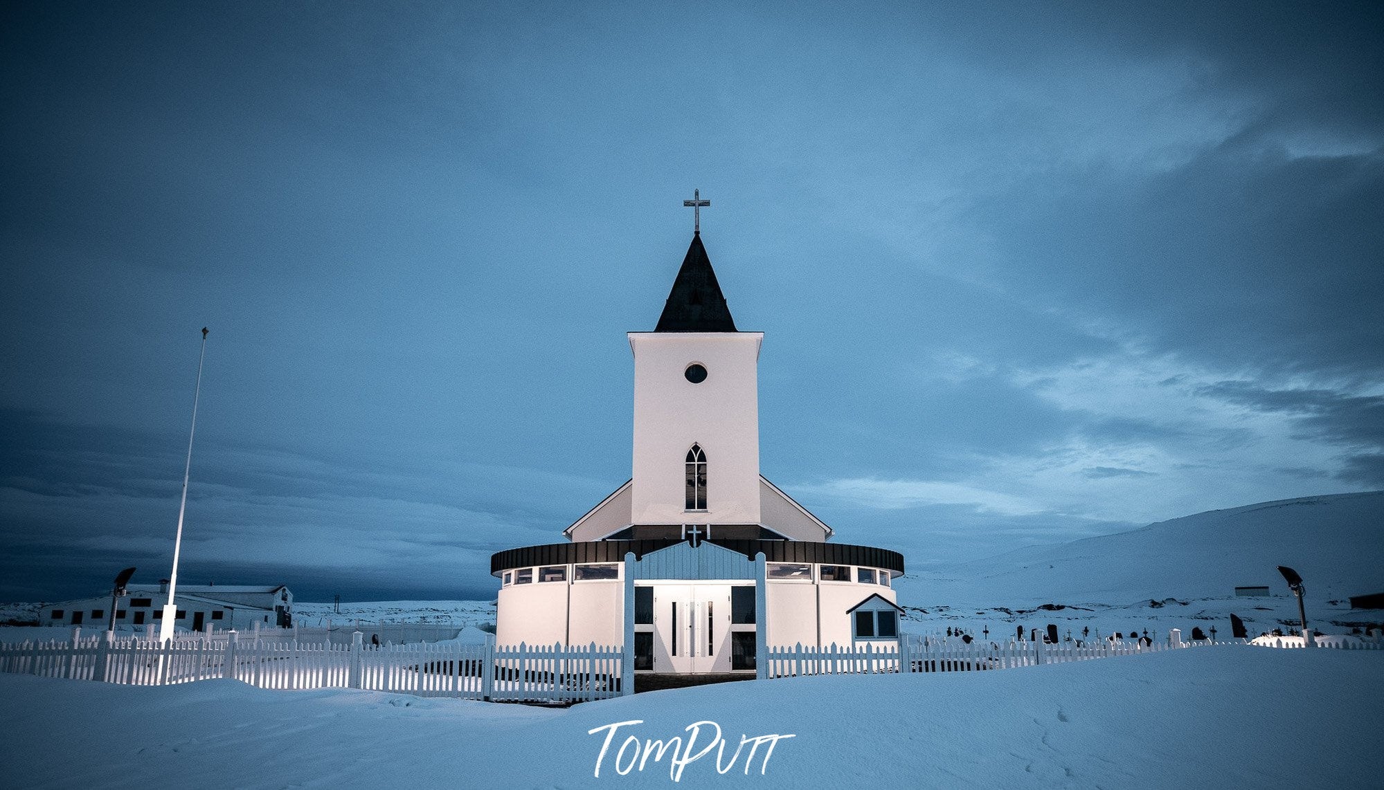 Beautiful city building with snow-covered land around, Iceland No.12