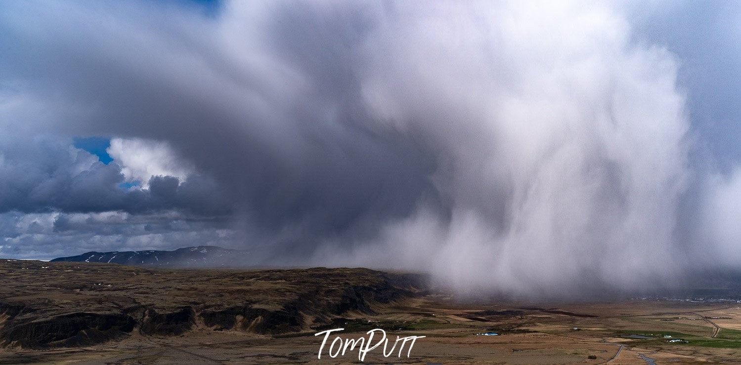 A massive smoky cloud with a large body, touching the earth, Iceland #28