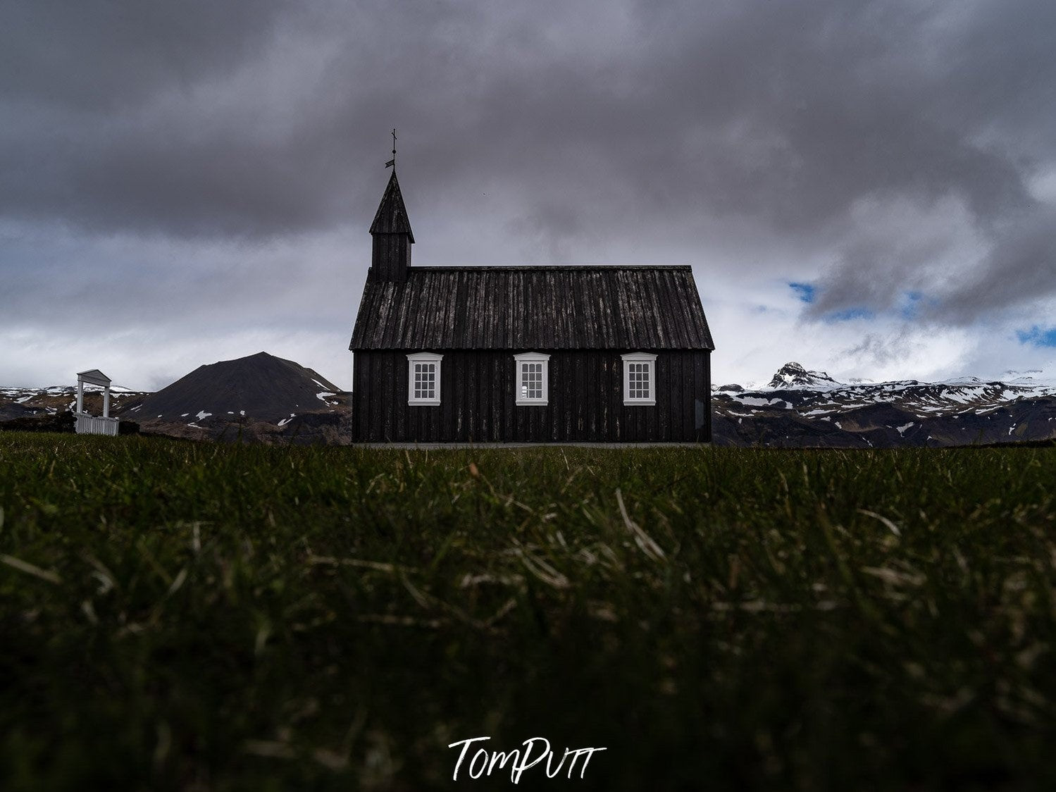 A house in a park and some heavy rain clouds over it, Iceland #29