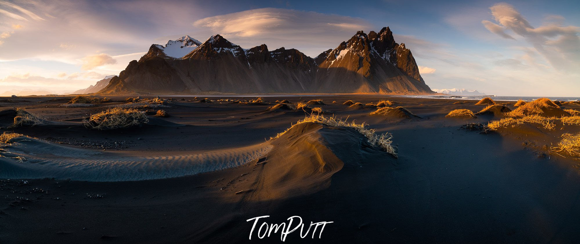 Long mountain walls with dark desert land effect in the foreground, Iceland #3