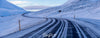 A wide road between the snowy land and mountains, Iceland #4