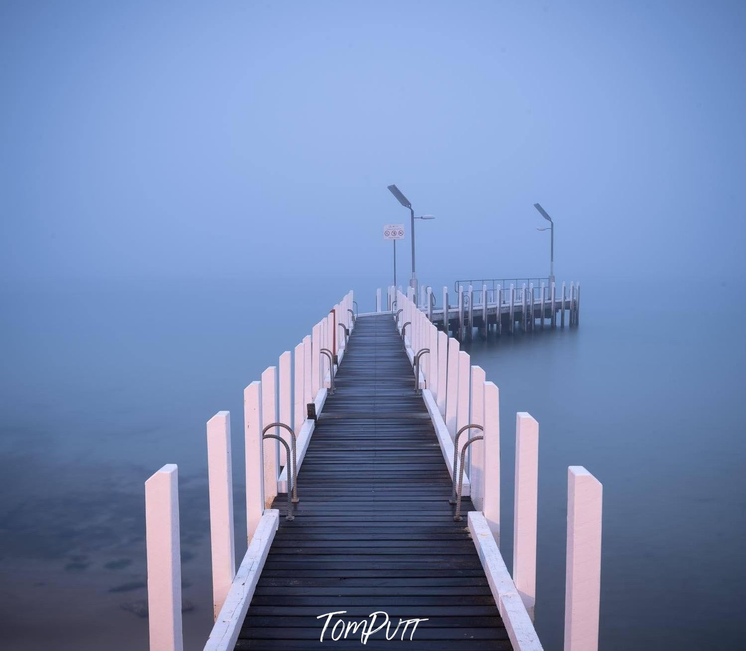 A woody bridge over the ocean with white pillars, Jetty mist, Safety Beach - Mornington Peninsula VIC