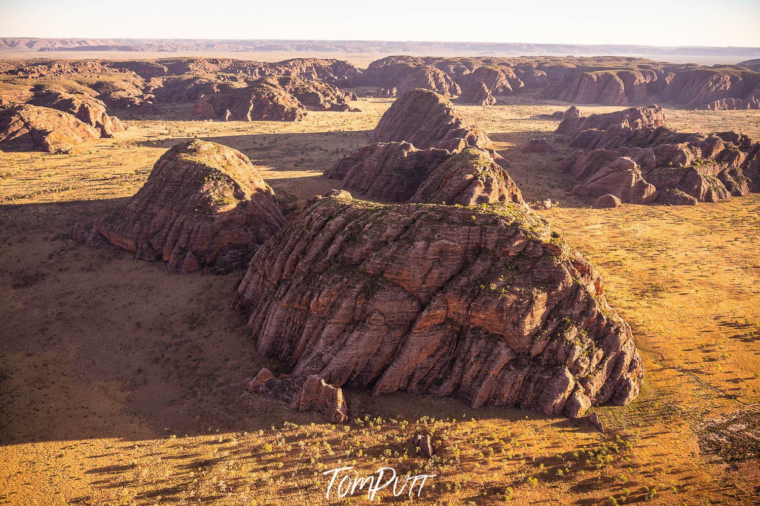 A large desert with many rocky mounds, Jurassic Domes, Purnululu, The Kimberley