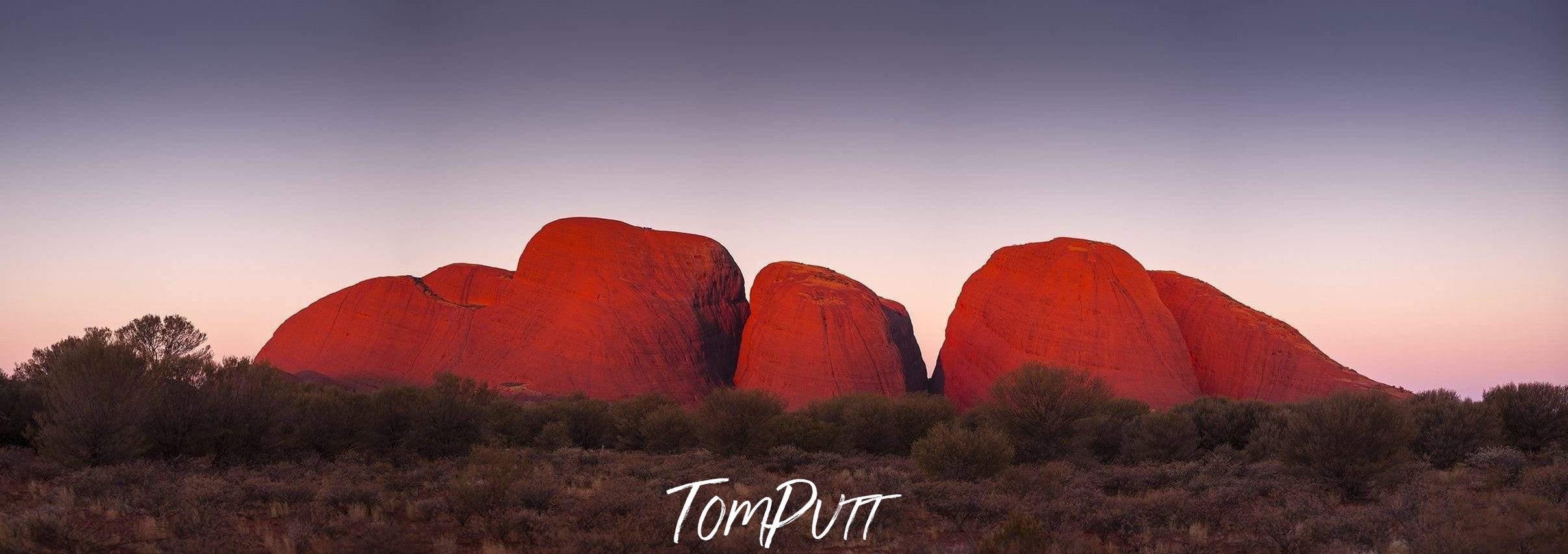 A group of stones after a greenery land, Kata Tjuta Sunset - Red Centre NT