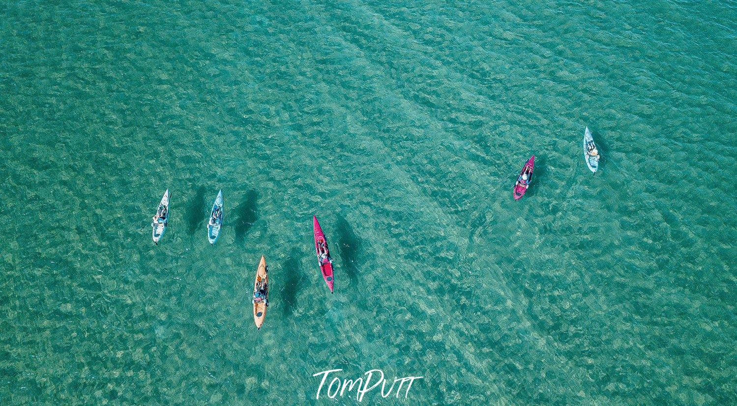 Aerial view of a green ocean with some colorful boats floating over, Kayak Fun - Mornington Peninsula VIC