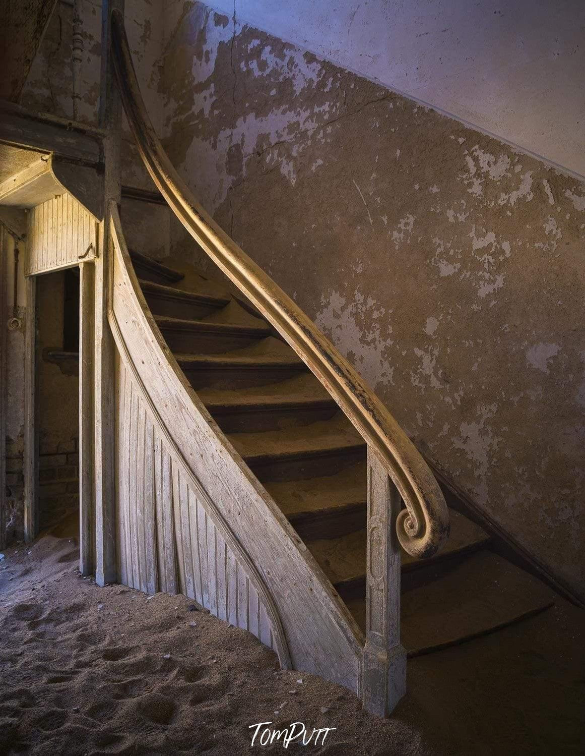 Wood stairs in a house with the damaged wall, Kolmanskop No.15