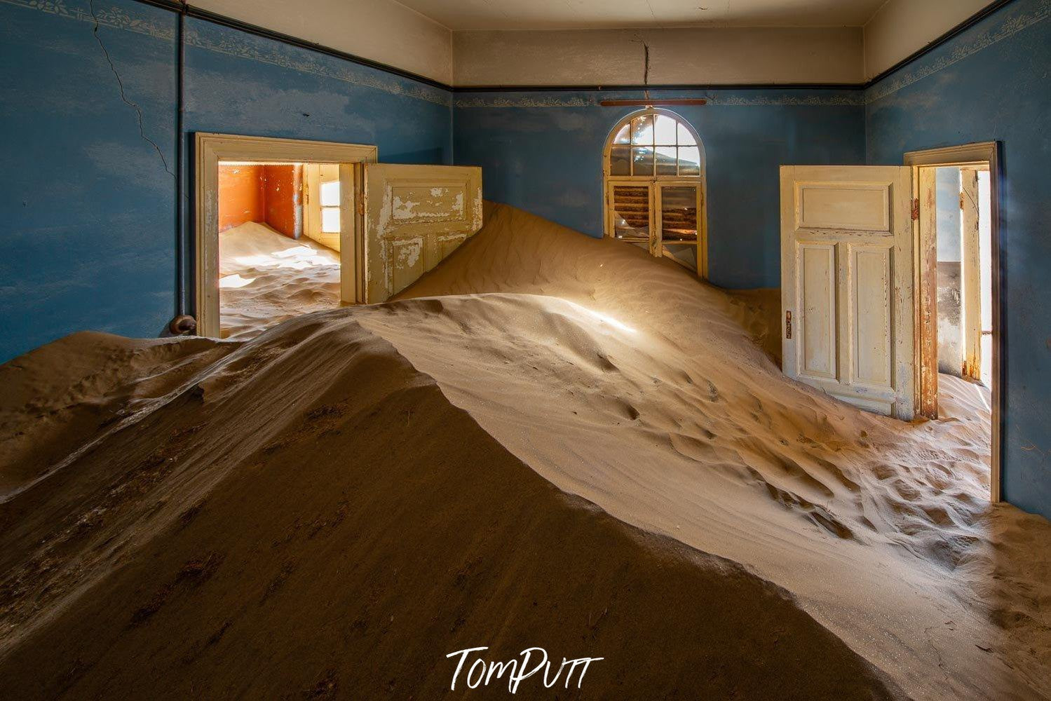 Making of a house room with a lot of construction sand inside, Kolmanskop No.26