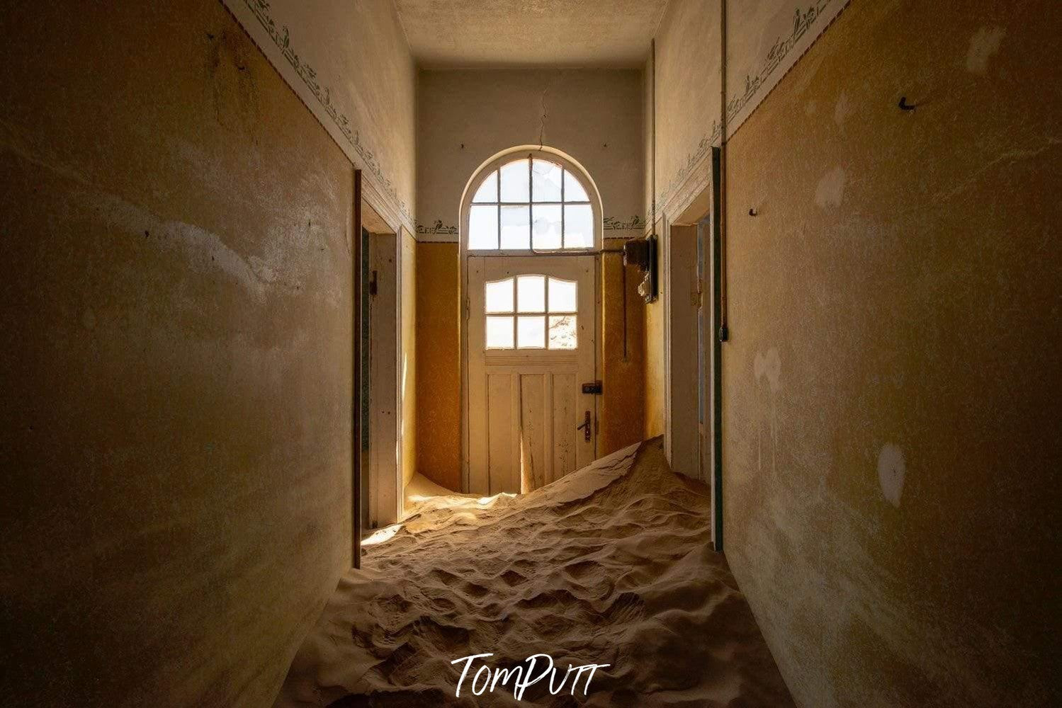 Making of a housing corridor with some construction sand inside, Kolmanskop No.30