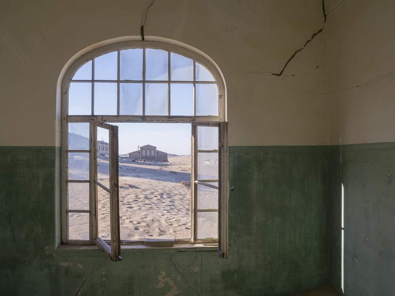 A damaged room with an open window, Kolmanskop #7