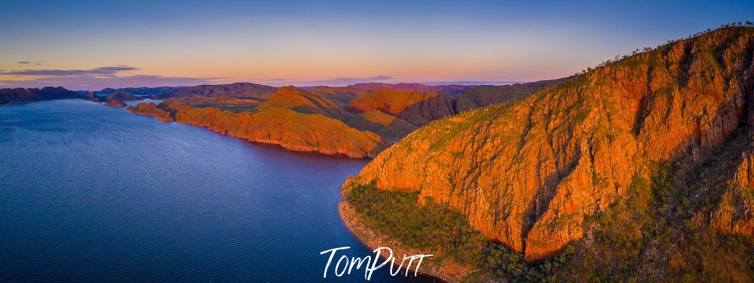 Giant mountain walls with the shiny effect of sunlight, and a sea after the mountains, Lake Argyle #16 - The Kimberley