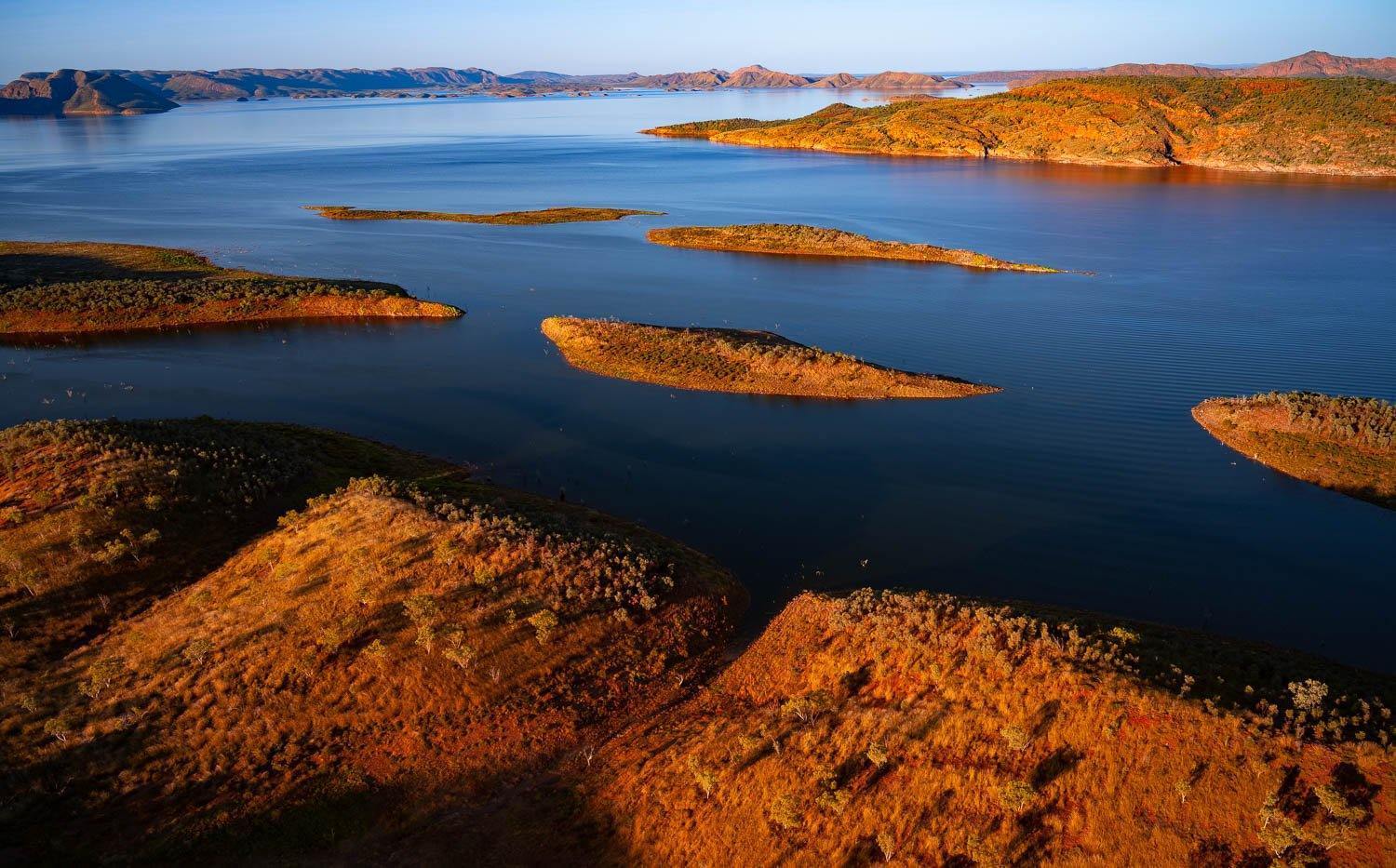Large mountains walls and a lake in between with some rocky islands, Lake Argyle #3 - The Kimberley