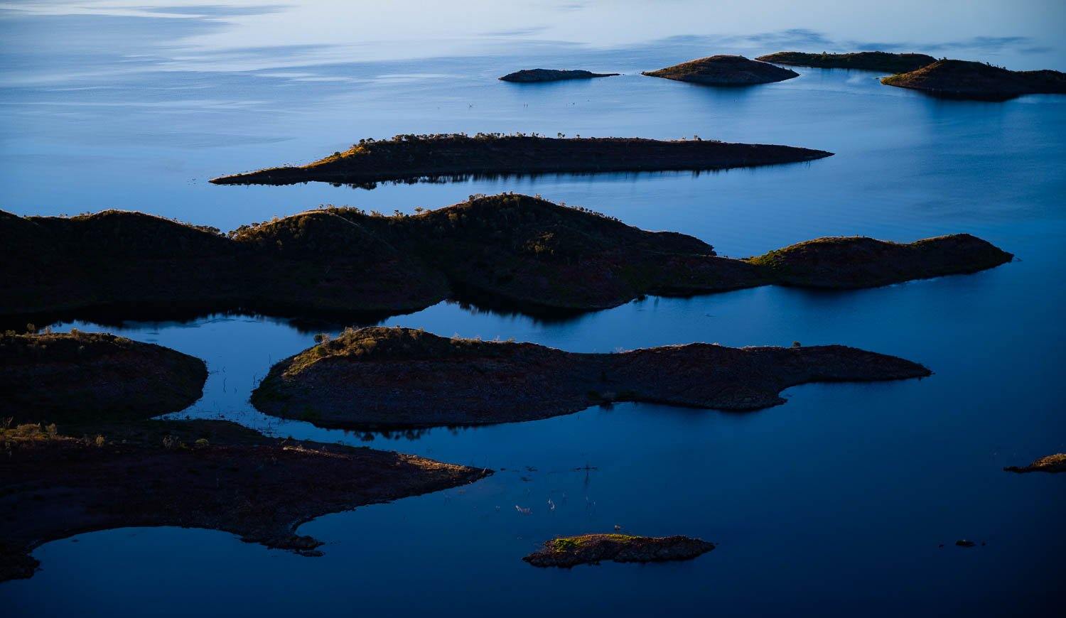 Large black mountain islands in the lake, Lake Argyle #6 - The Kimberley