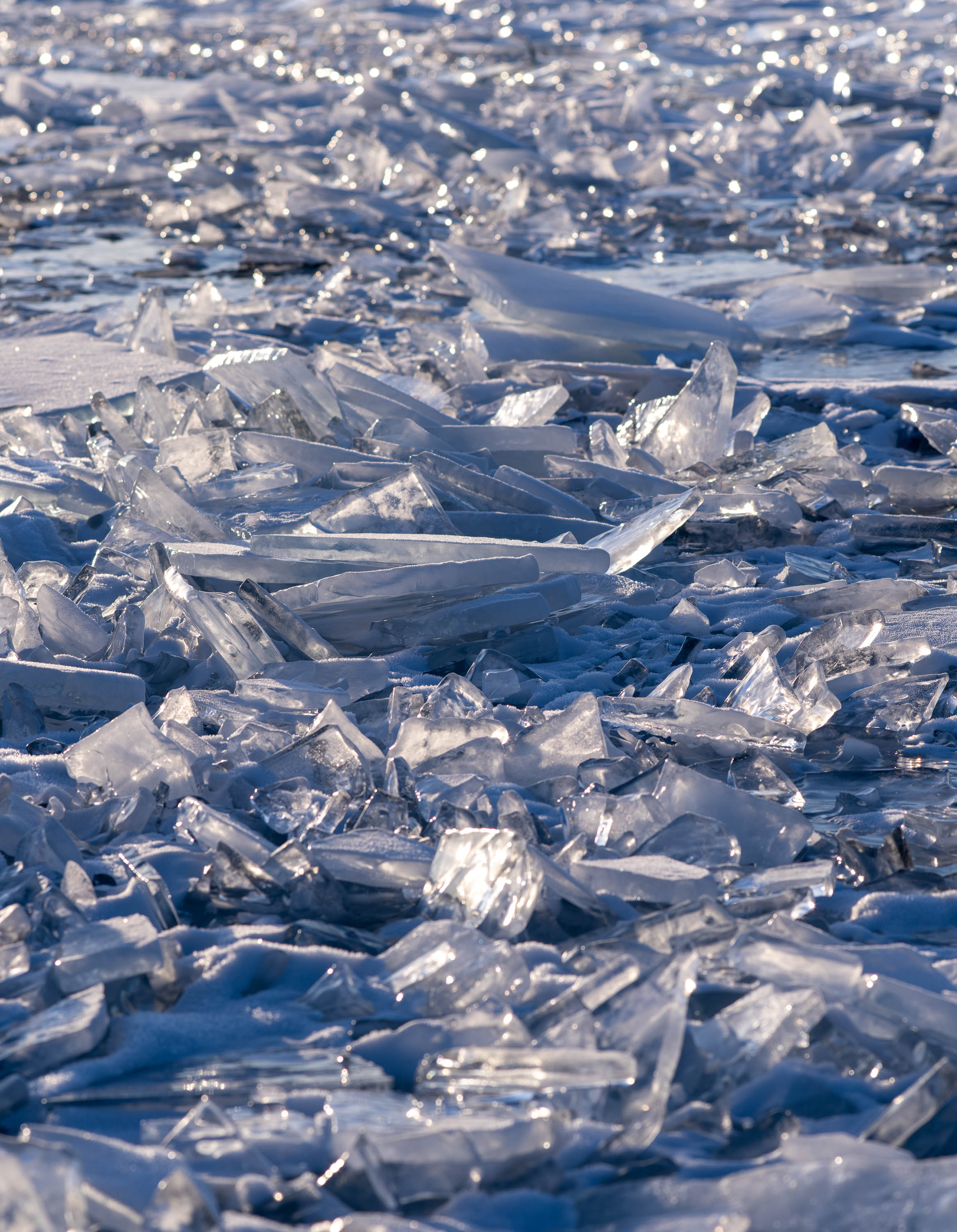 Crystalline glass-like ice on a fully snow-covered land, Lake Baikal #10, Siberia, Russia