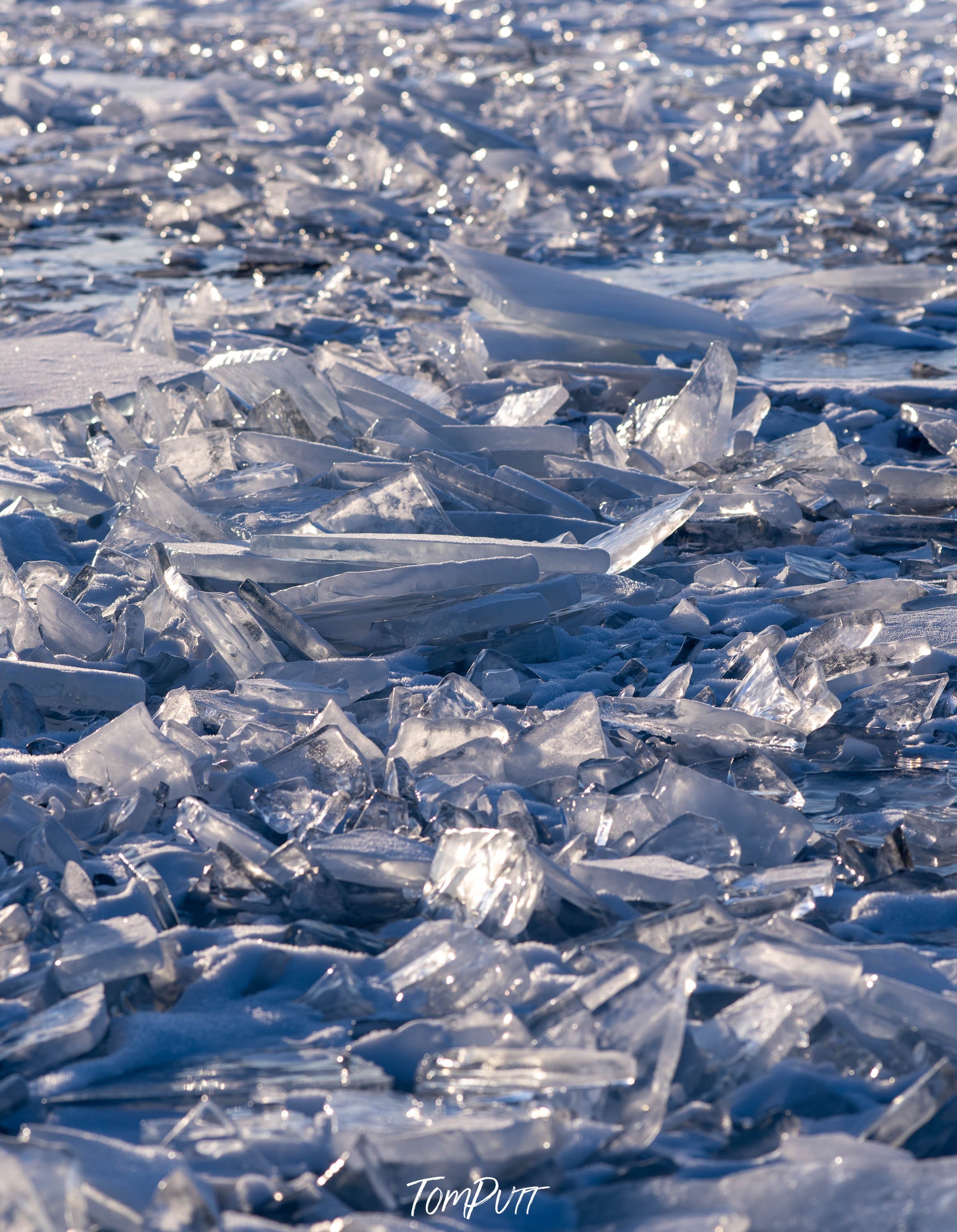 Crystalline glass-like ice on a fully snow-covered land, Lake Baikal #10, Siberia, Russia