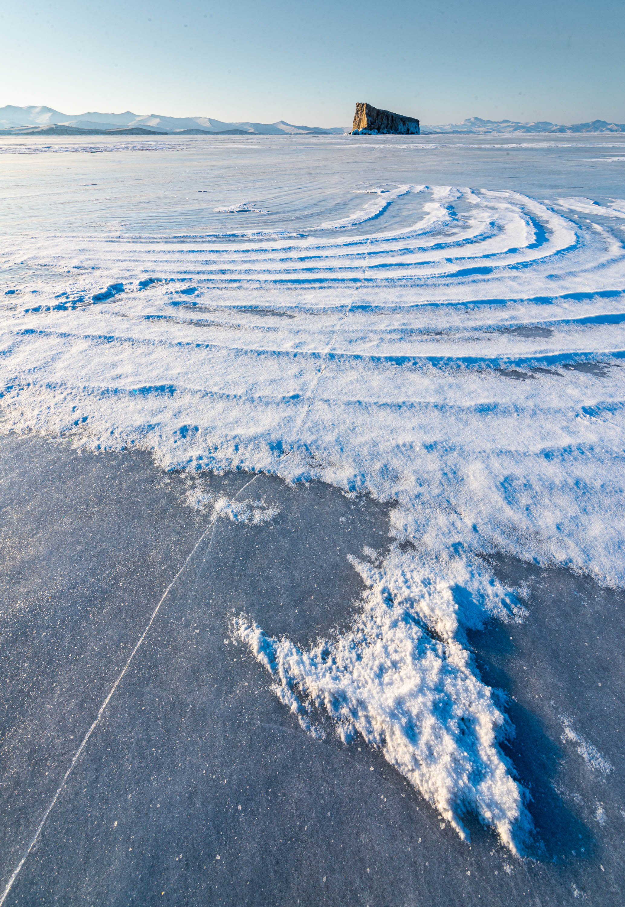 A snow-covered area with some snow spread like a powder, Lake Baikal #25, Siberia, Russia