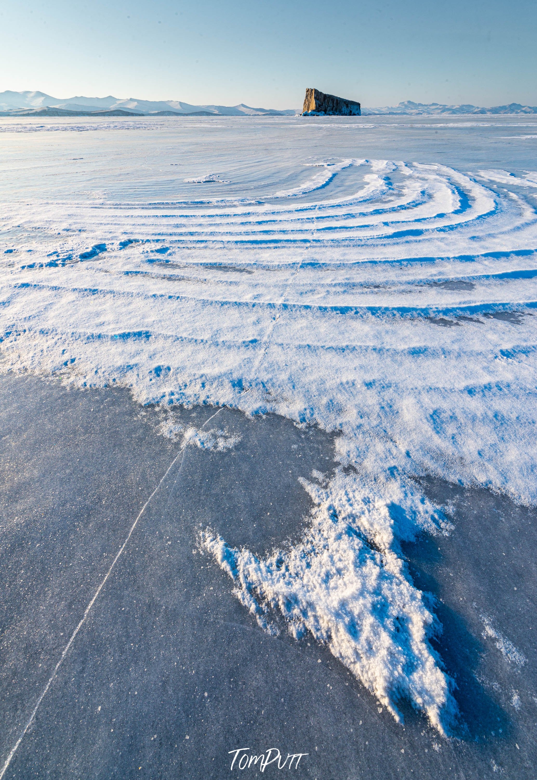 A snow-covered area with some snow spread like a powder, Lake Baikal #25, Siberia, Russia