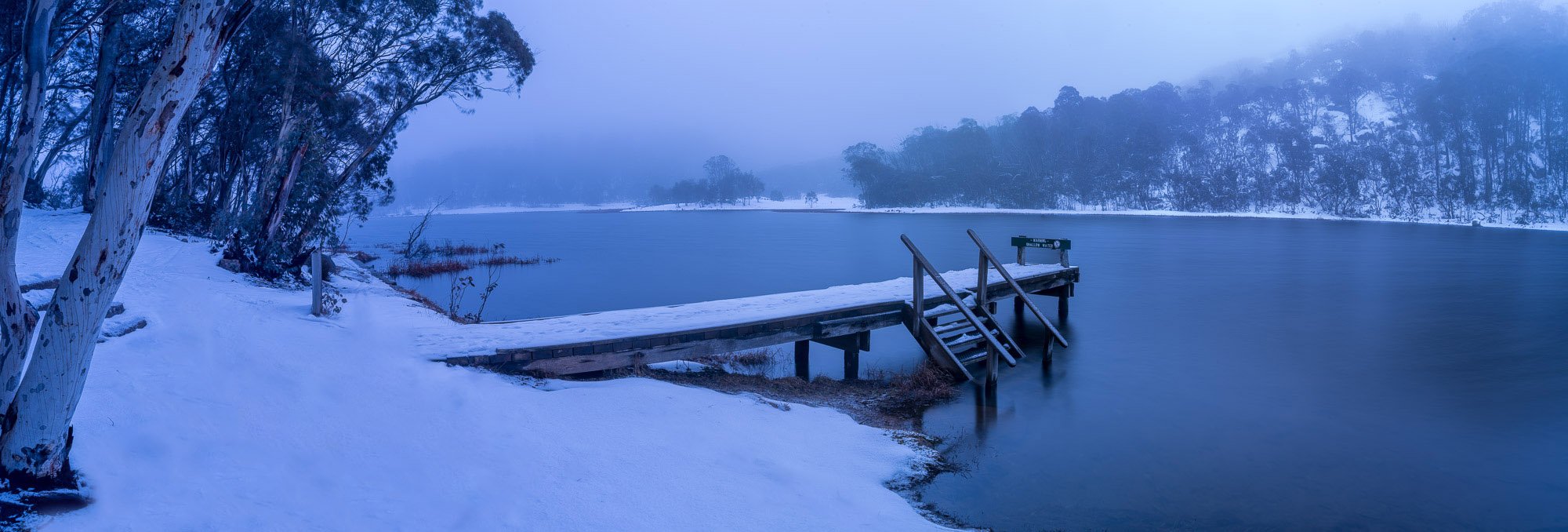 A frozen land with a lake, and a wooden bridge in the water, Lake Catani Mount Buffalo - Victorian High Country