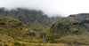 A greenfield area with two big grass mounds, Lake Harris, Routeburn Track - New Zealand