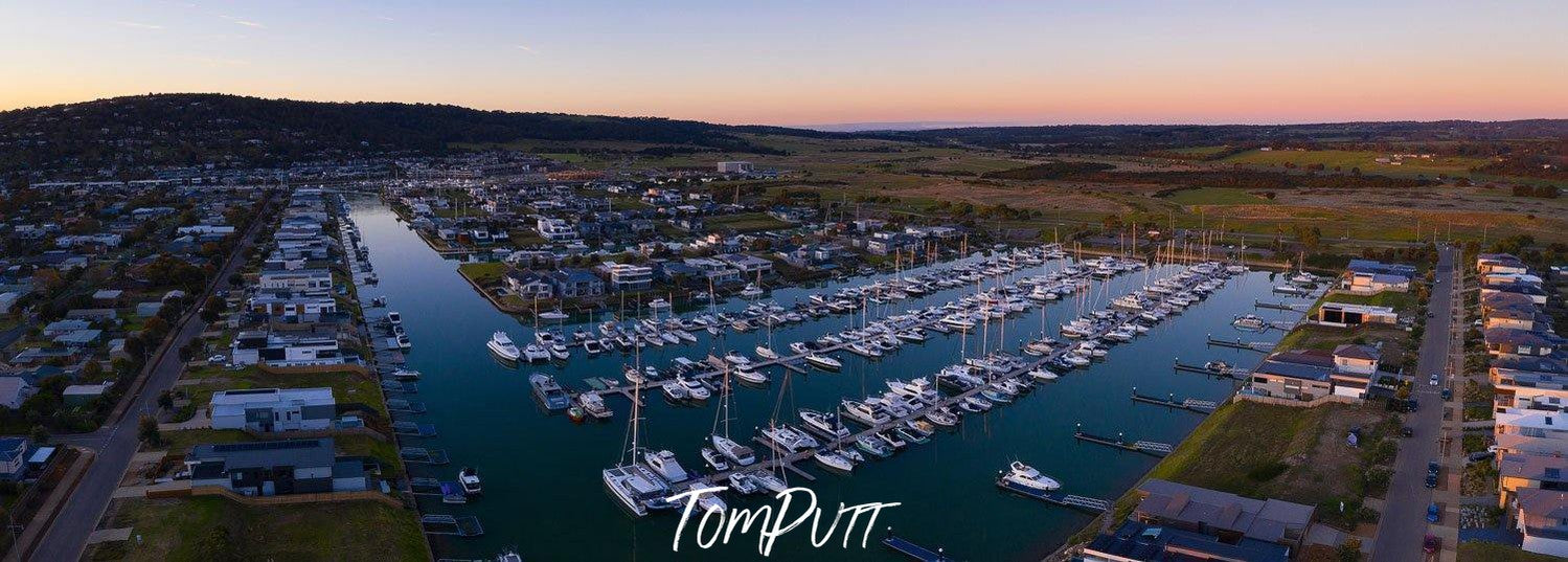 Aerial view of the coast of the sea with a lot of boats standing, Last Light, Martha Cove - Mornington Peninsula VIC