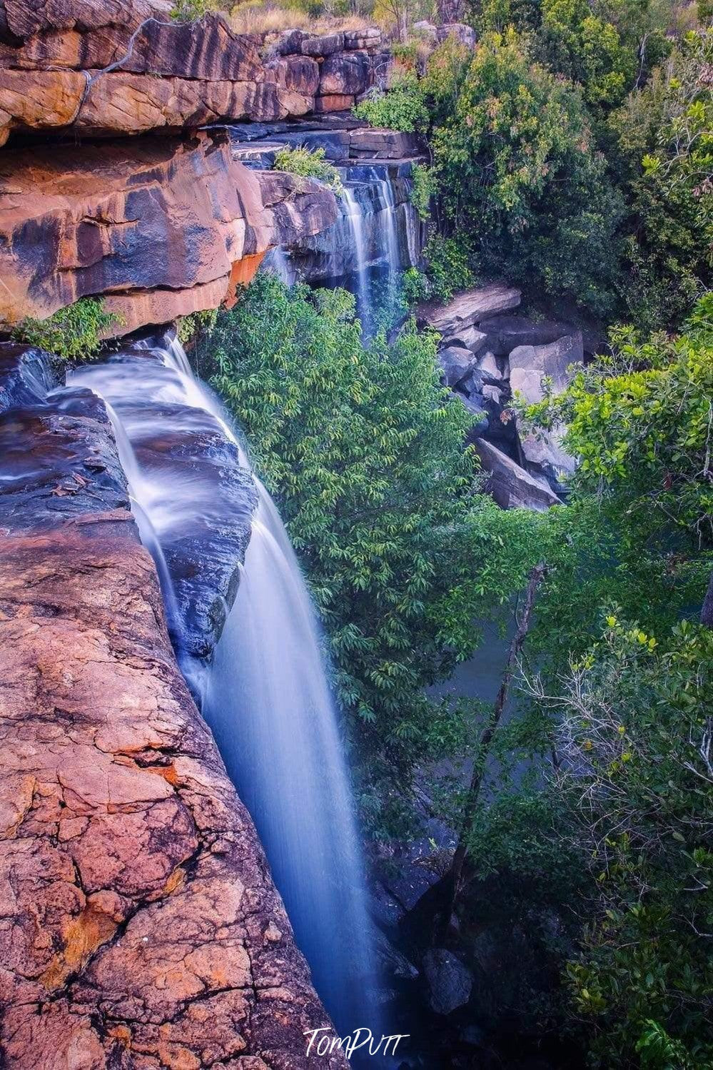 High rocks with a waterfall and a lot of plants and trees around, Little Mertens - The Kimberley WA