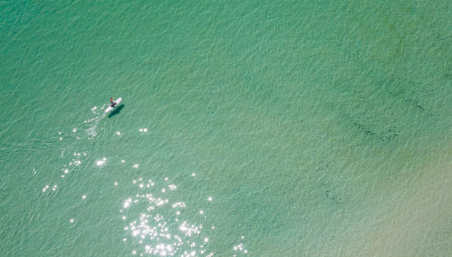 Aerial view of a sea with a floating boat, Lone Paddler #2 - Mornington Peninsula VIC