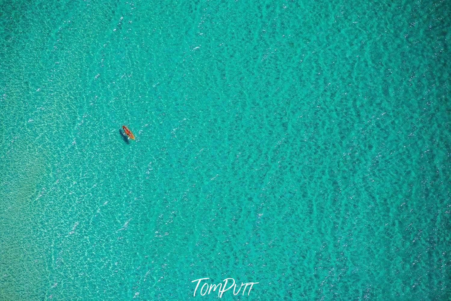 Aerial view of a green water sea with a floating boat, Lone Paddlers Mornington Peninsula Art