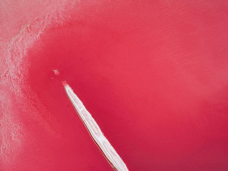 Aerial view of a pink ocean-like surface, Lone Point Namibia Art