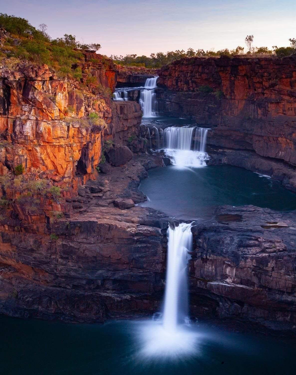 Nested waterfalls from a mountain and from a lake, Mitchell Falls at Dusk, The Kimberley, Western Australia