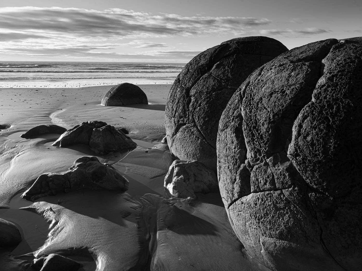 Giant boulder on a seashore-like land, Moeraki BW New Zealand Art
