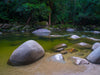 Lake with greenery around, and rounded stones over, Mossman Gorge Boulders, The Daintree - Queensland