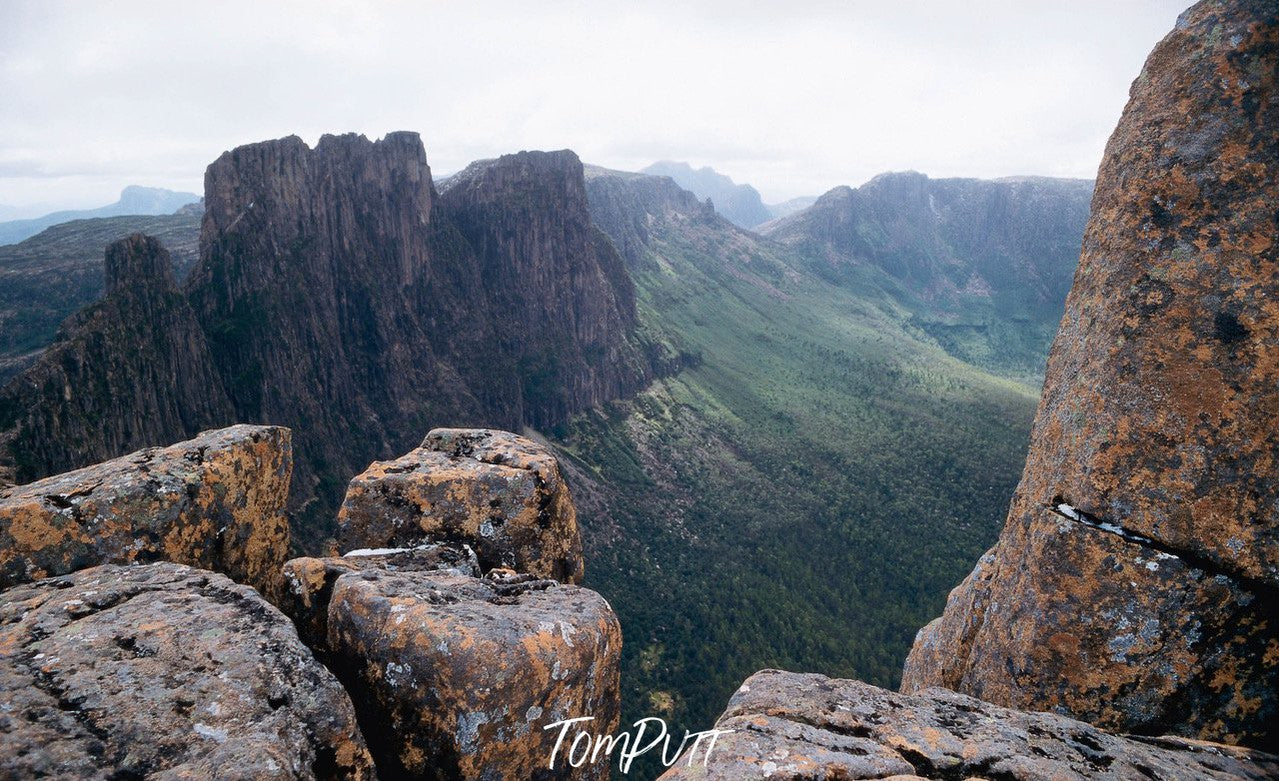 Large stones on a hill area with a long mountain hill area in the background, Cradle Mountain #36, Tasmania