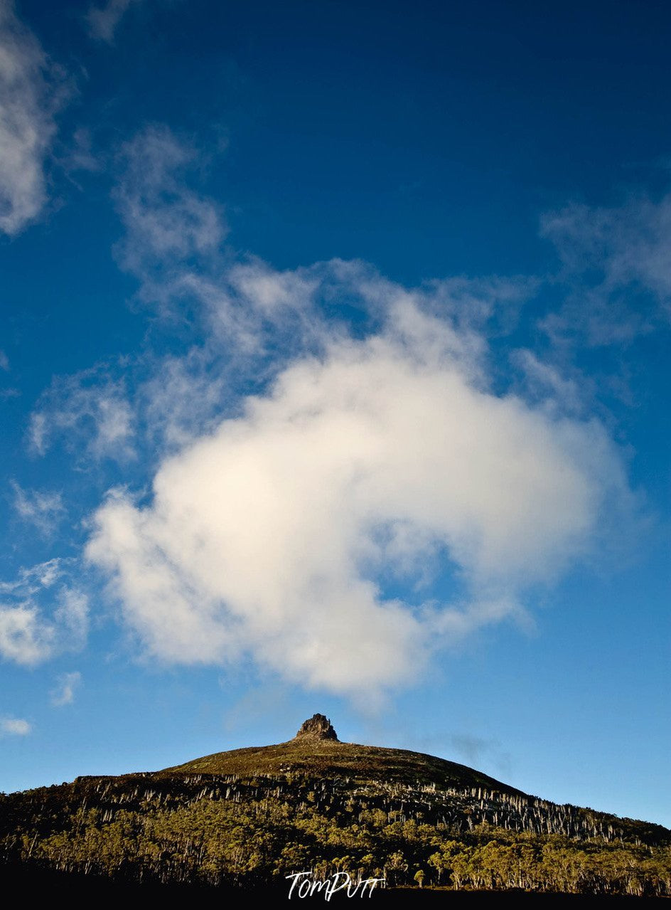 A mountain peak point with rounded white clouds over it, Cradle Mountain #8, Tasmania 