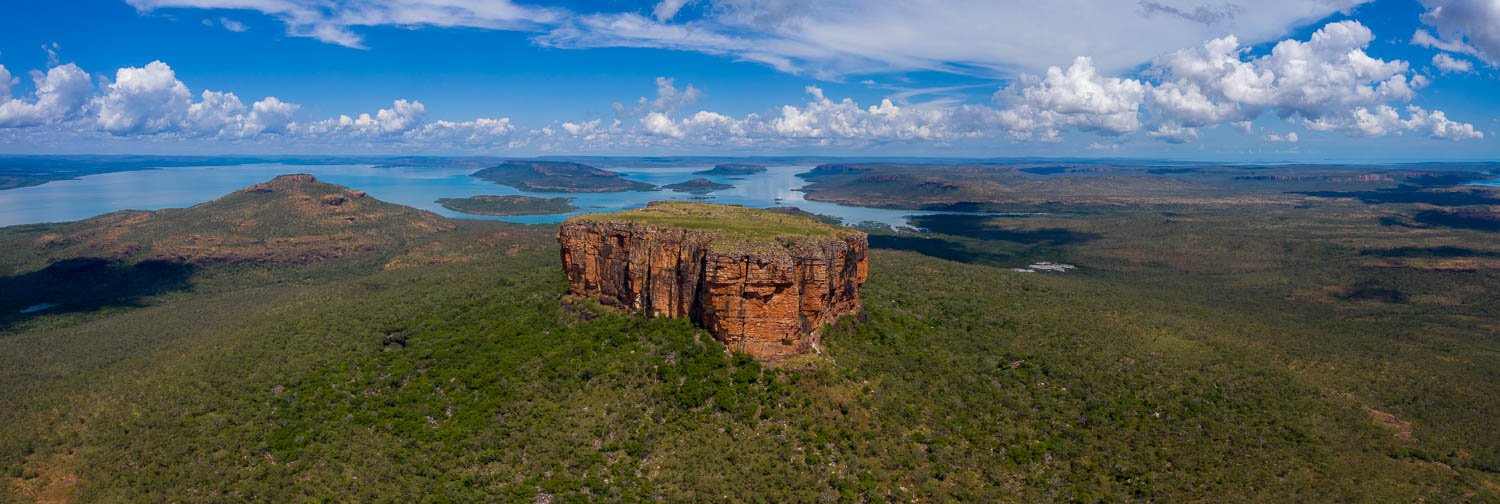 Aerial view of a standing stone between a wide greeny area, Mount Trafalgar Panorama, The Kimberley, Western Australia