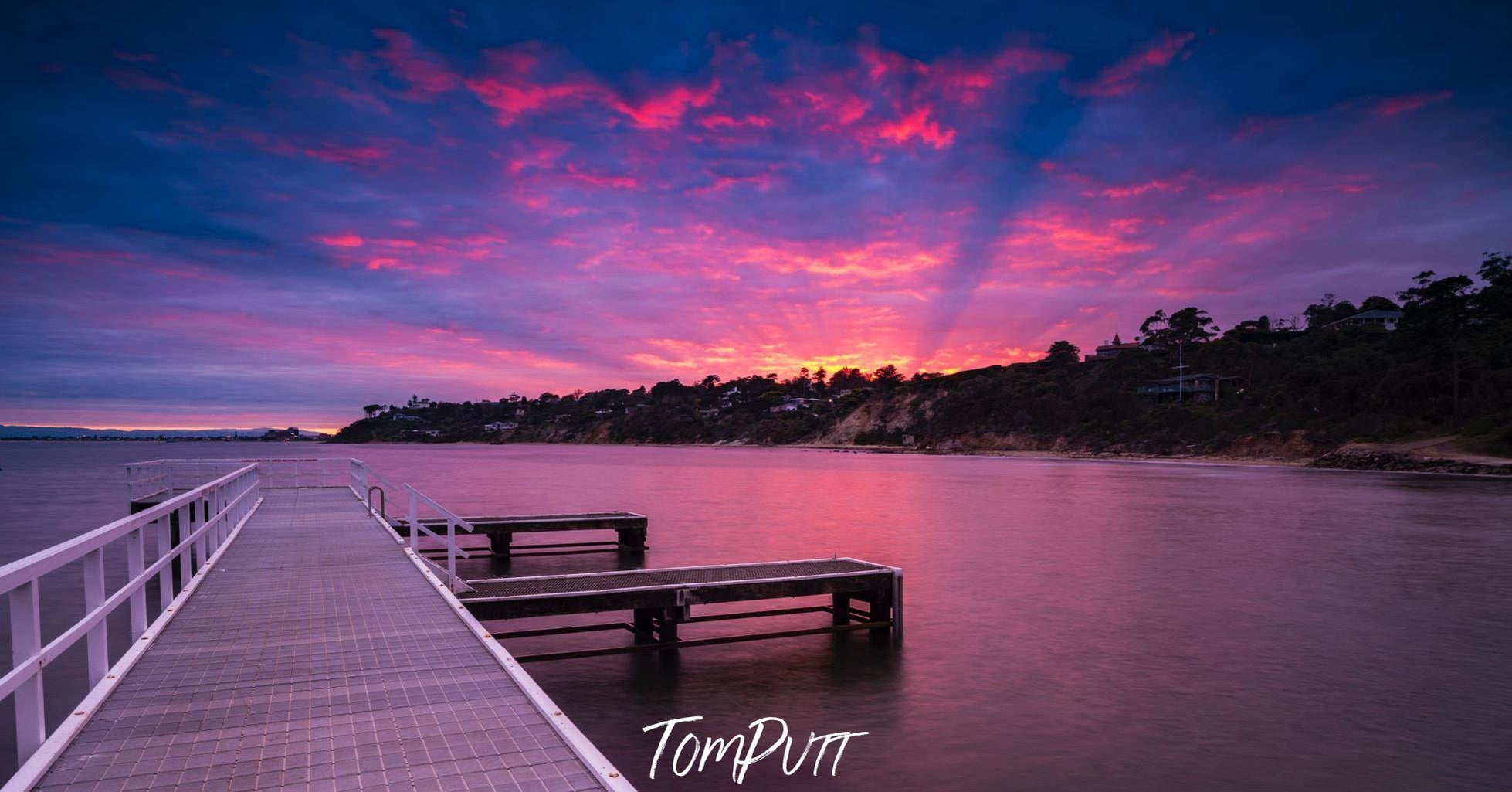 A wooden bridge over water a lake, and a pinkish weather effect, Mt Eliza Sunrise - Mornington Peninsula VIC