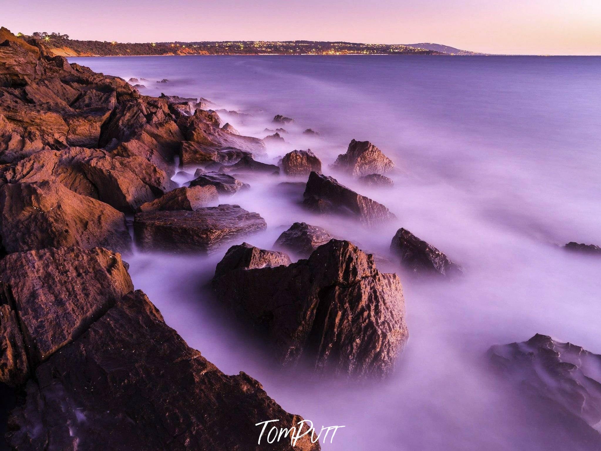 Huge mountain with large rocky stones below covered in heavy smoke, Mt Martha dusk