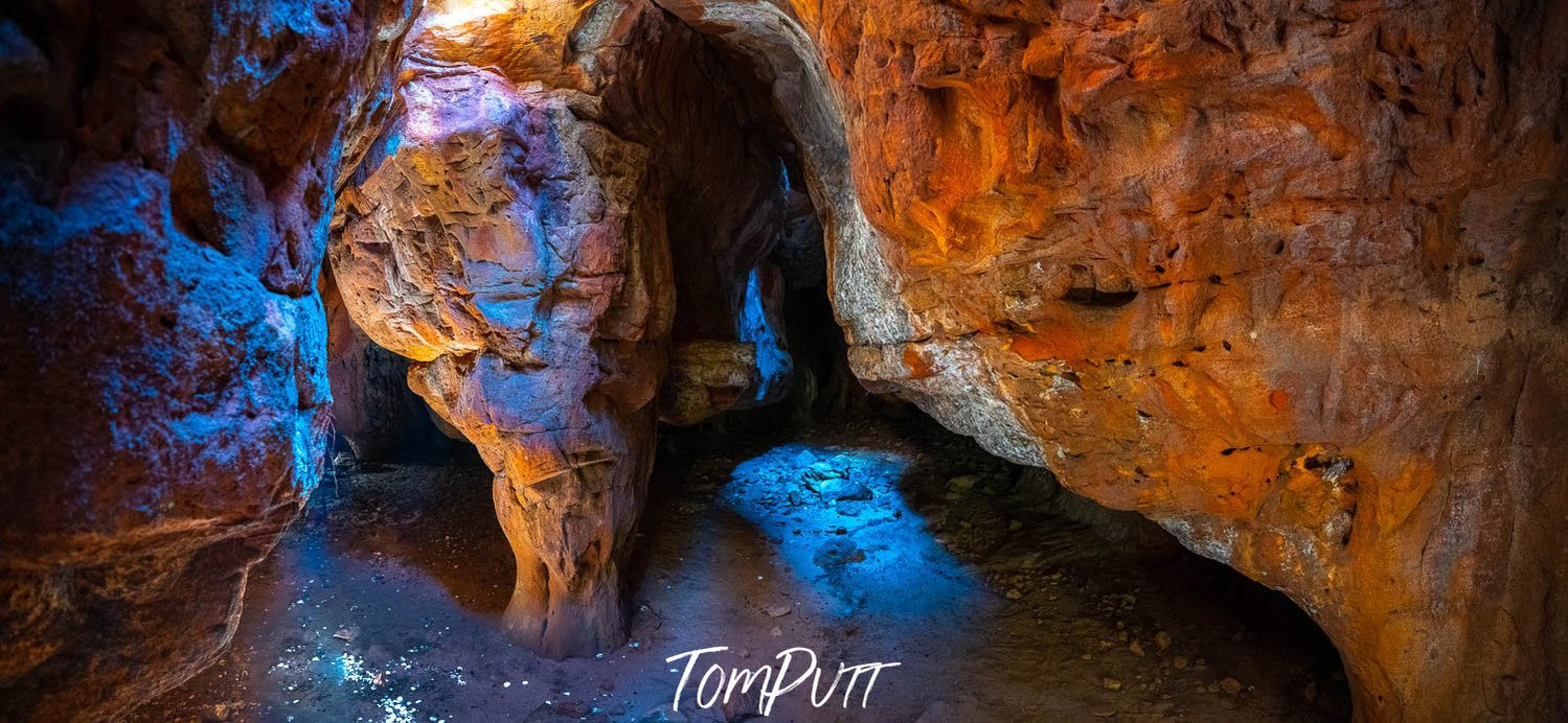 A lake under giant mountain walls, Mystic Cave, The Kimberley, Western Australia