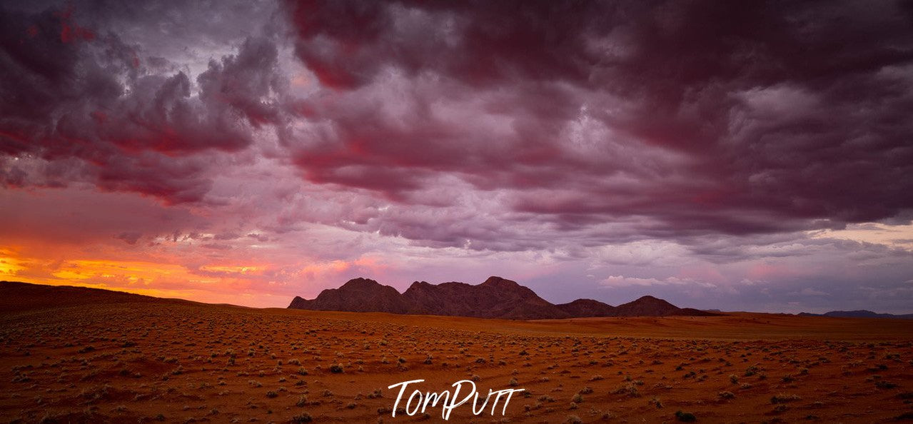 A mountain wall below huge stormy clouds, Namibia No.2, Africa