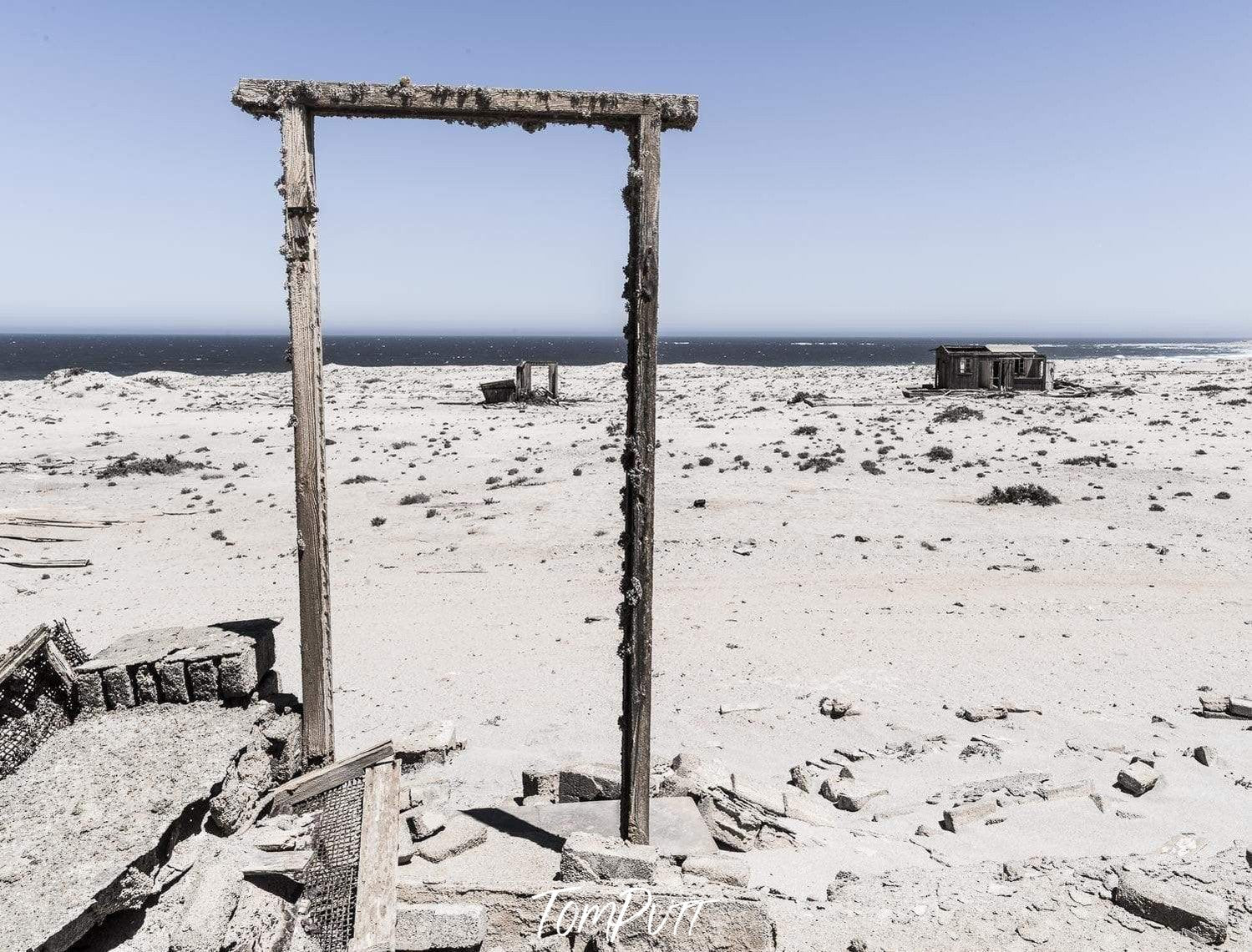 Standing wooden sticks making a door like shape, Namibia #5