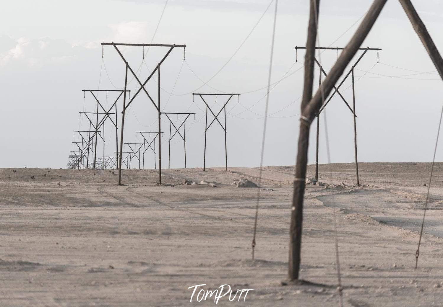 Long series of electricity towers with some wires connected, Namibia No.9