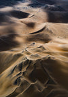 Aerial view of a desert with huge waves of sand, Neverending