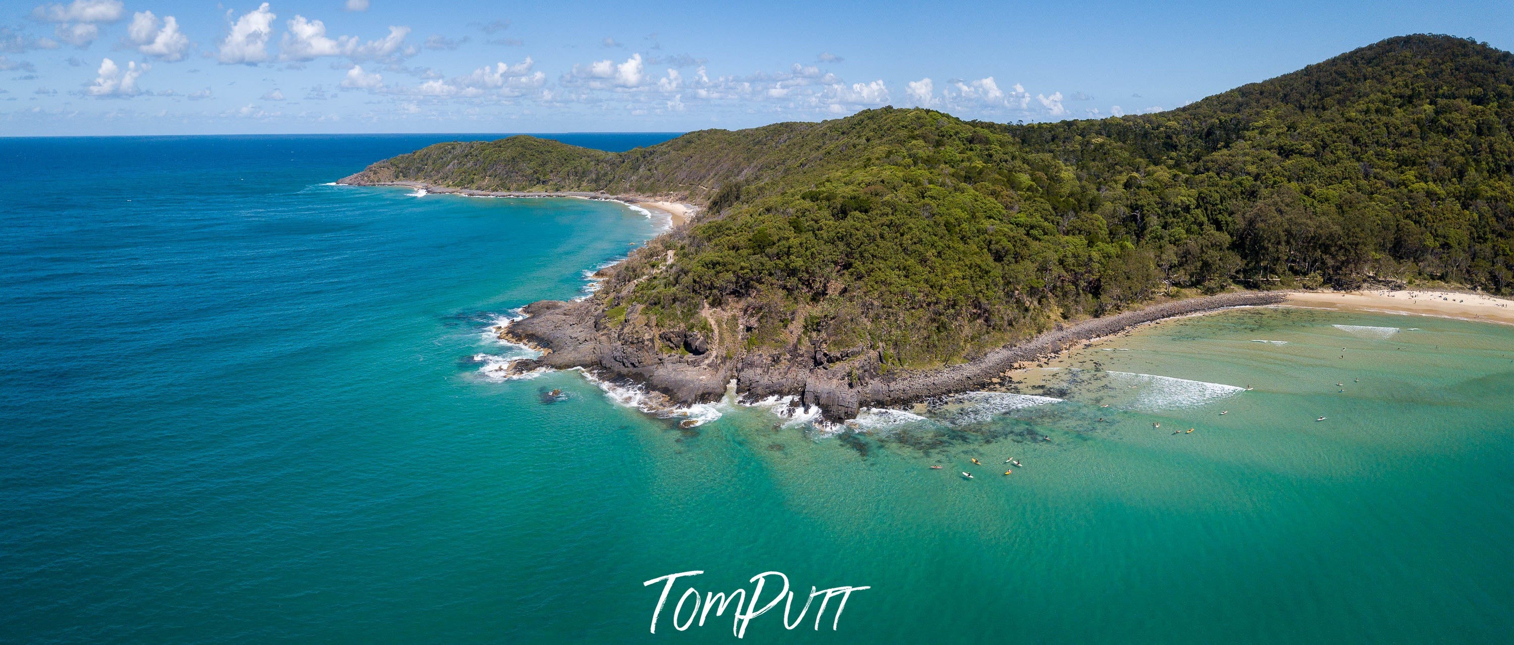 A giant island full of green plants, grass, and bushes, Noosa National Park, Queensland