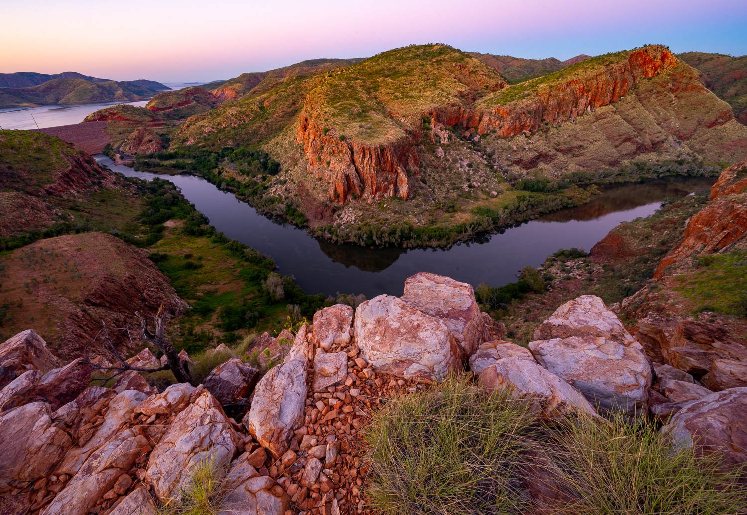 Large green and stony mountain walls with a small water course below, Ord River Bend, The Kimberley, Western Australia 