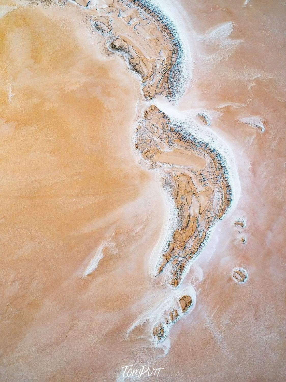 Aerial view of a mustard-land area with two weird shapes of mounds, Pastel Tones