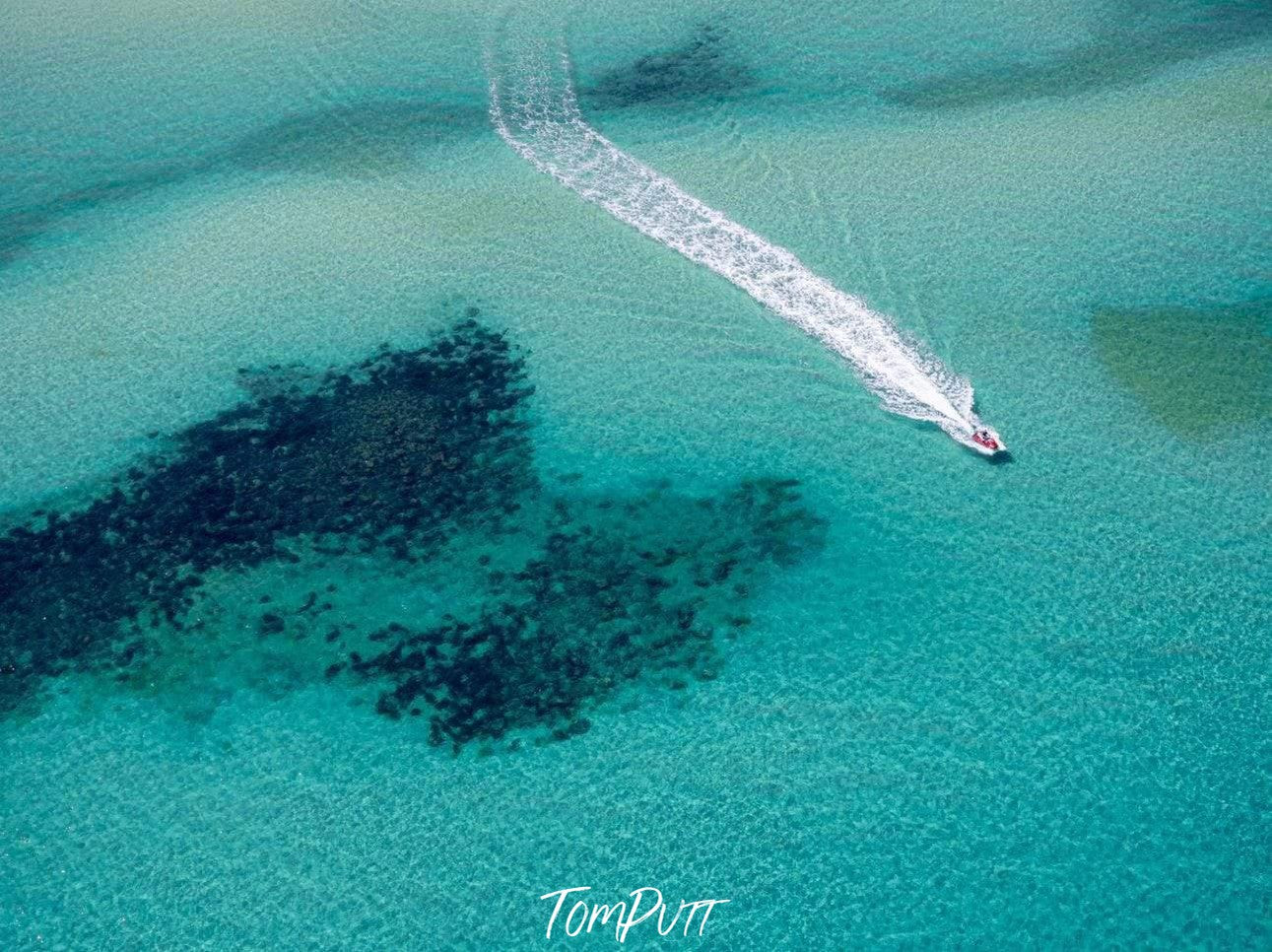 Aerial view of a sea with a boat passing over, Playtime - Mornington Peninsula VIC