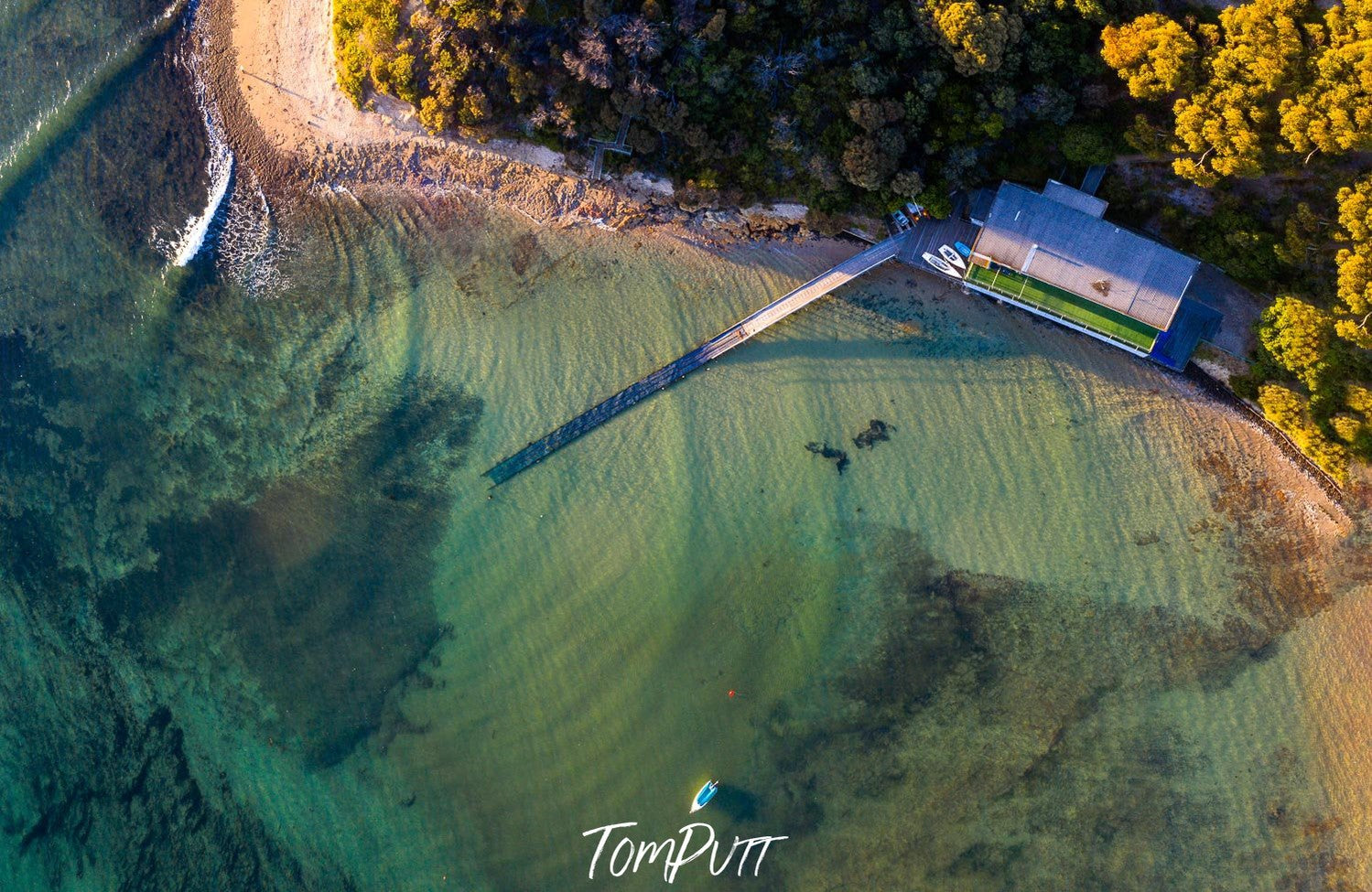 Aerial view of the green lake with a lot of greenery on the outer land, Point Leo Yacht Club from above - Mornington Peninsula VIC