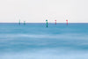 Colorful poles standing in a center of an ocean, Poles, Rye - Mornington Peninsula VIC