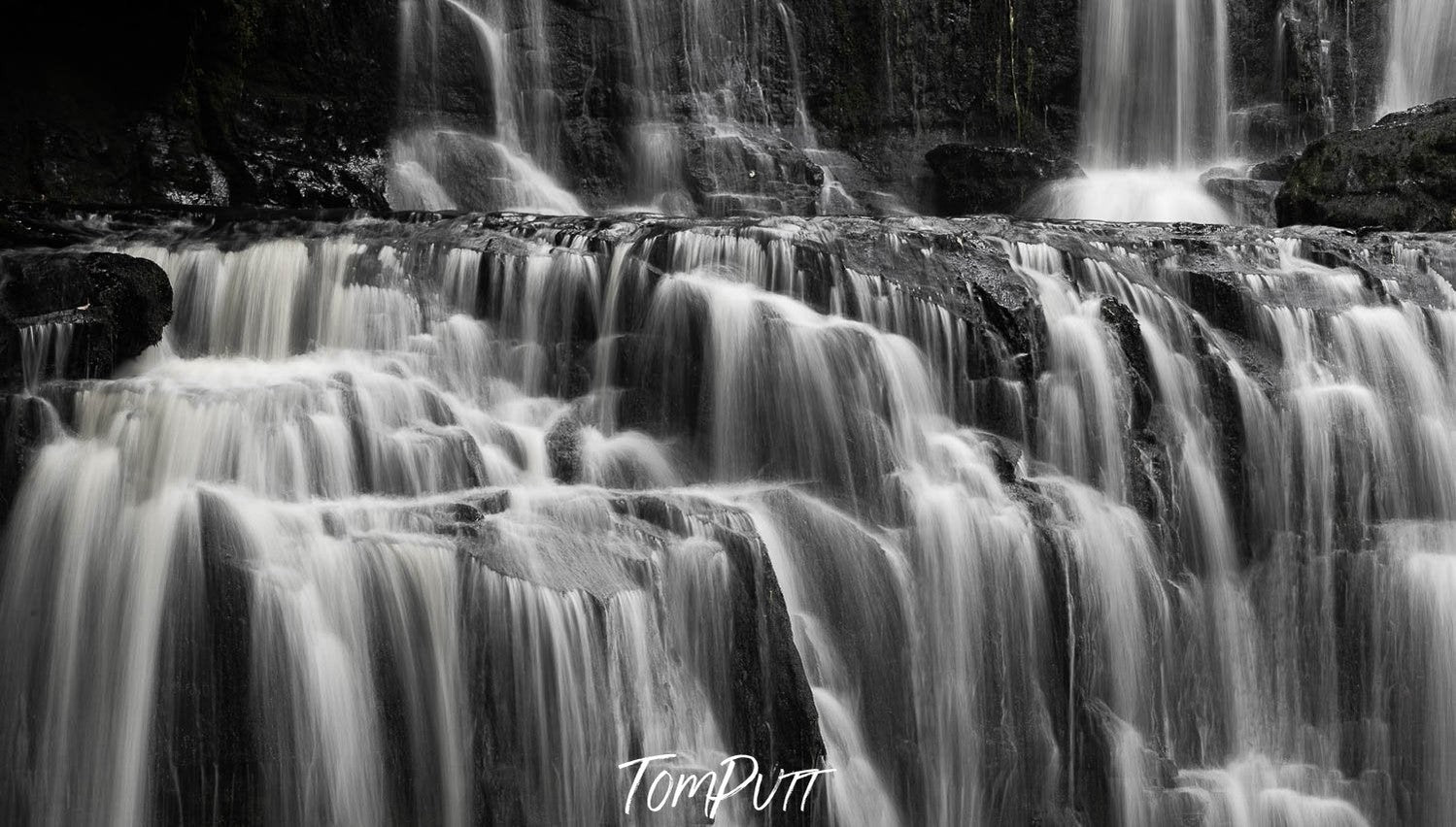 A heavy waterfall from a mountain wall, New Zealand #11